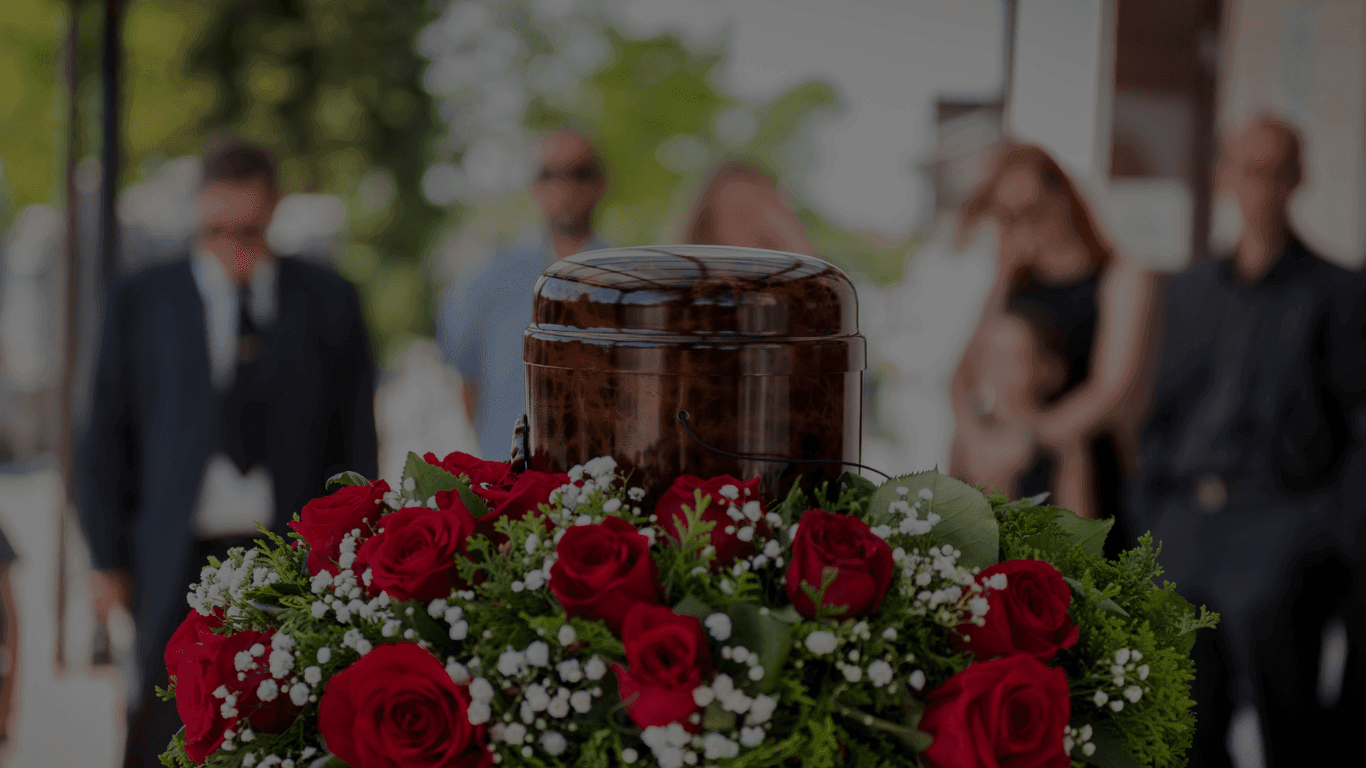 REM Legacy Foundation - Why We Help: Photo of a family at a funeral